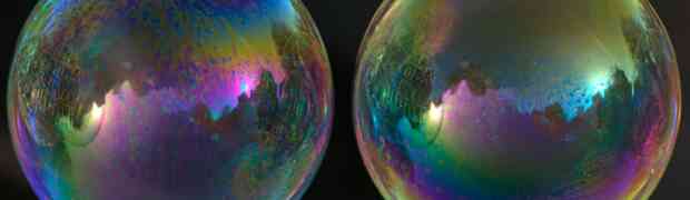 Chemomechanical Simulation of Soap Film Flow on Spherical Bubbles